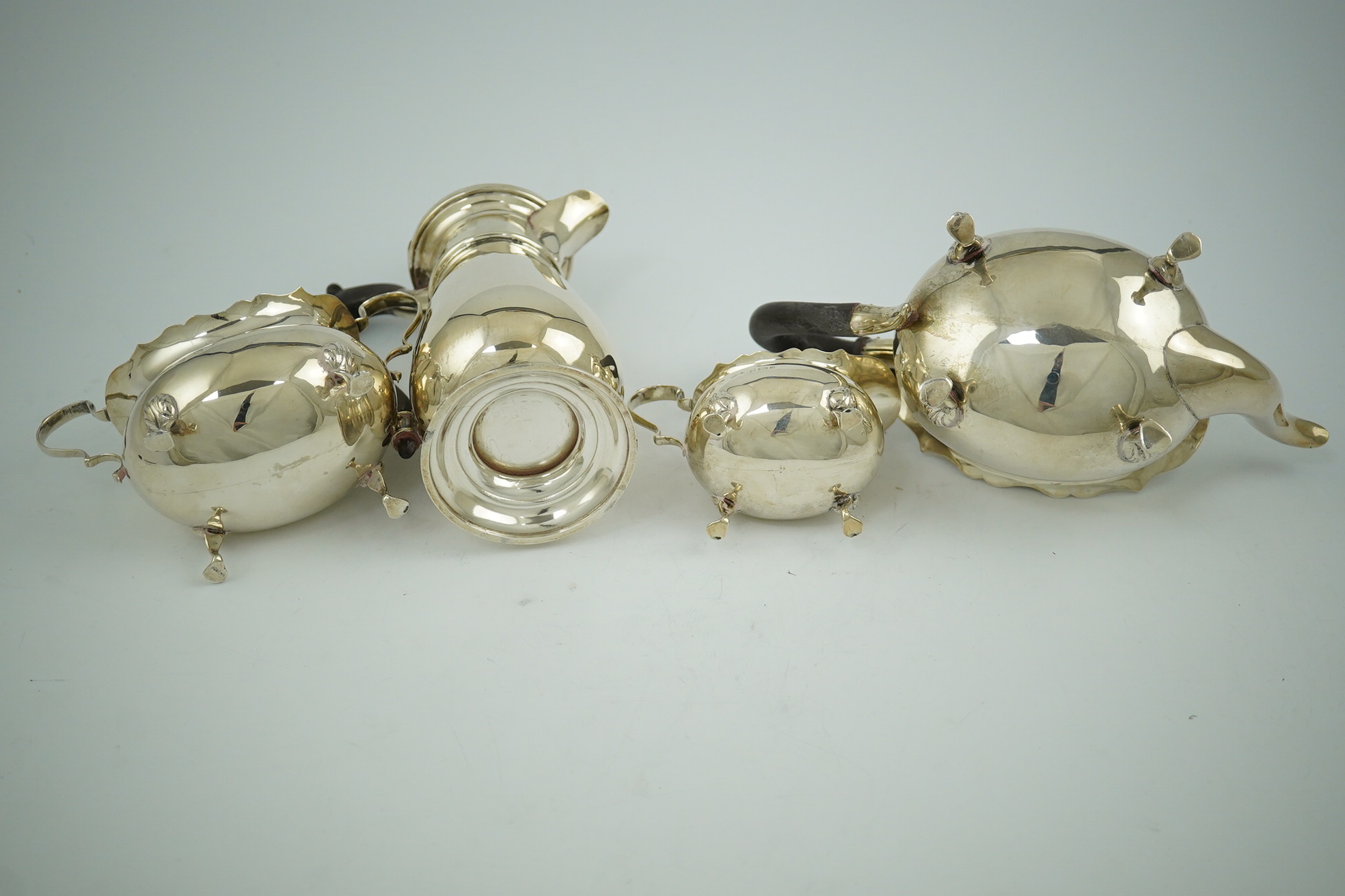 A late Victorian silver four piece tea set by Walker & Hall